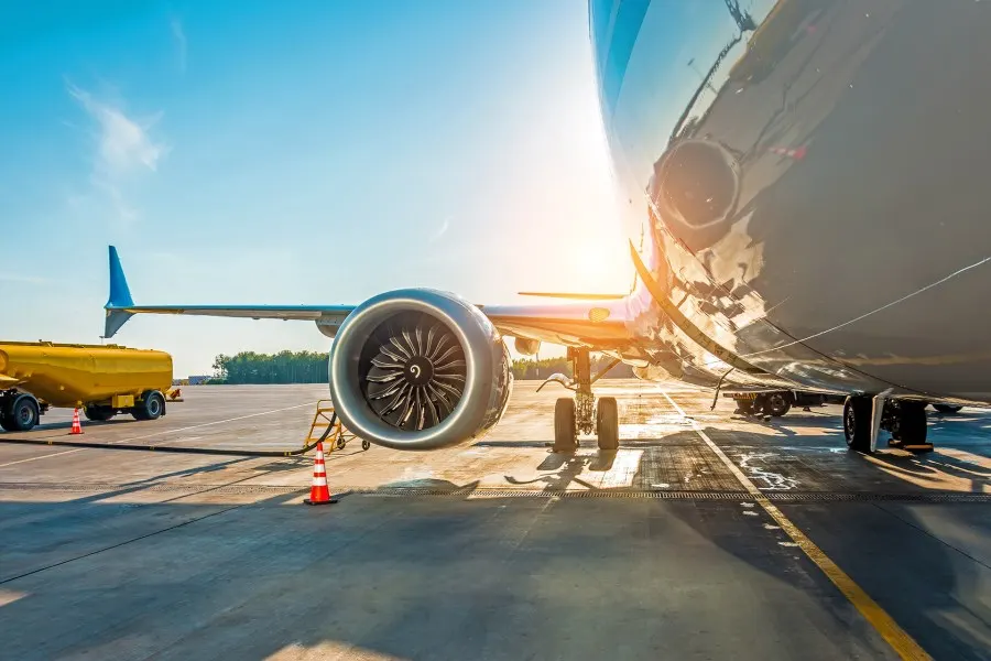 Jet on the ramp beside a fuel truck
